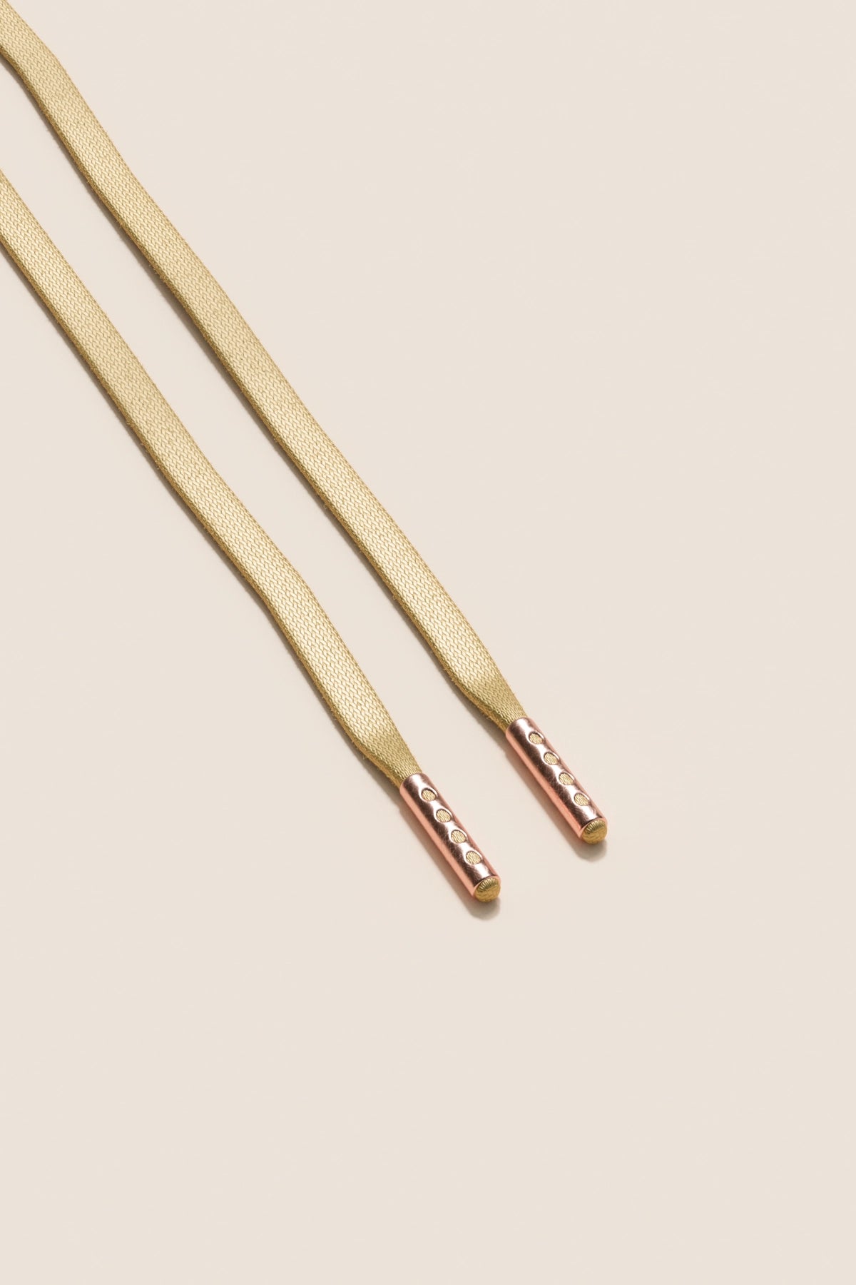 Senkels Champagne 3mm Flate voksede skolisser med Rosegull-dupper